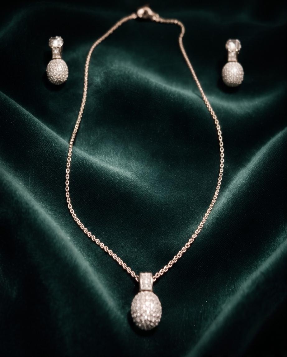 Elegant Silver Jewelry Set with Pendant Necklace and Matching Earrings