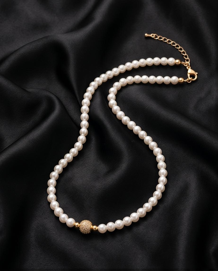 Elegant Faux Pearl Necklace with Gold‑Tone Clasp and Accent Bead