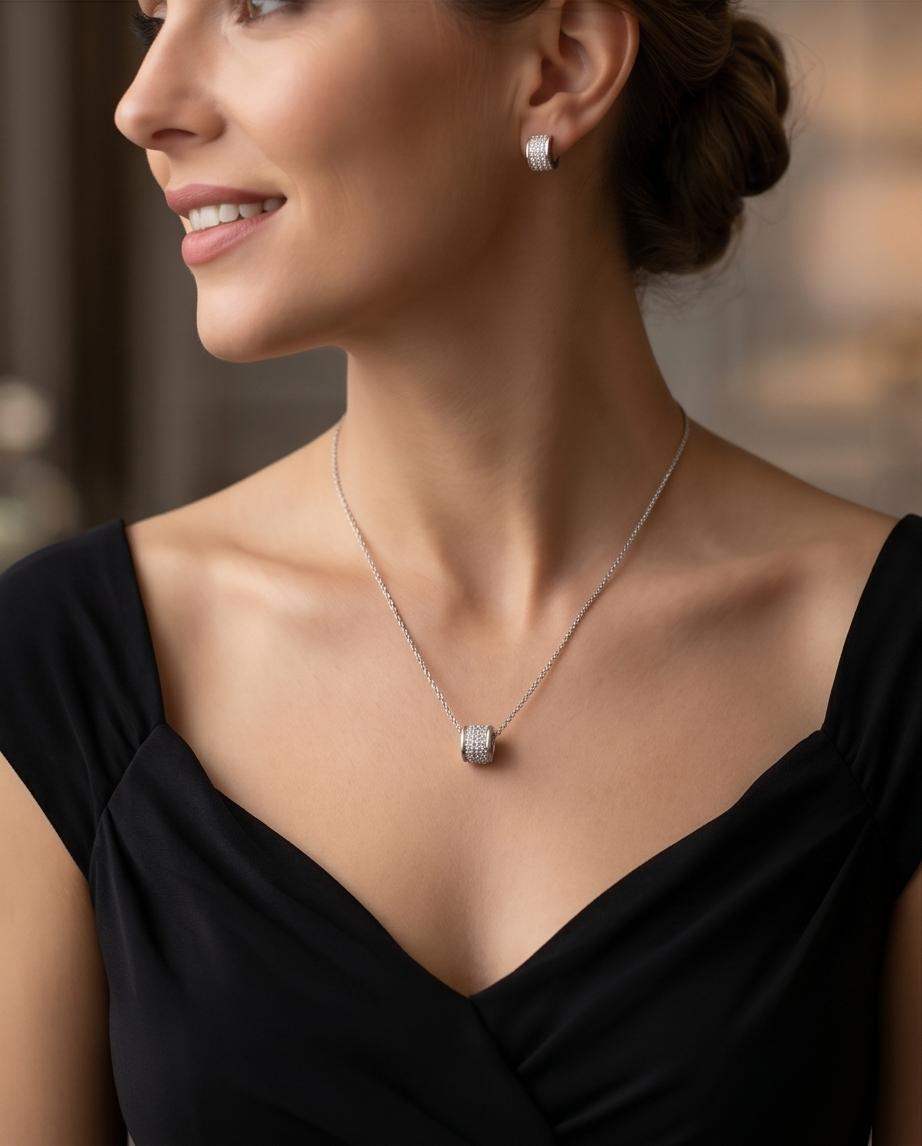 A refined silver‑tone necklace and earring set