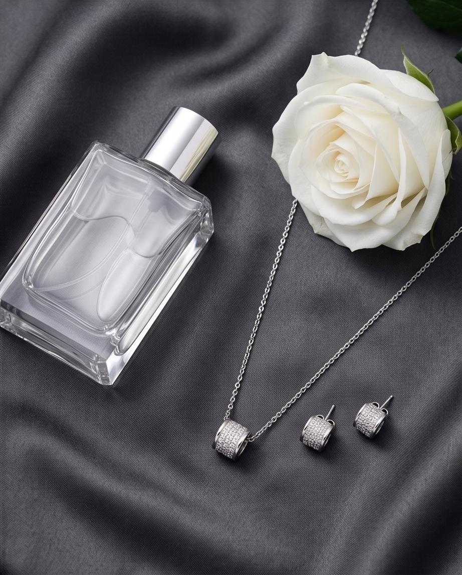 A refined silver‑tone necklace and earring set