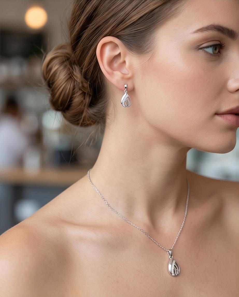 Elegant Silver‑Tone Teardrop Necklace & Stud Earrings Set
