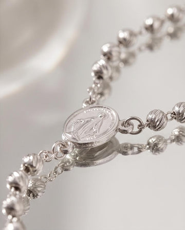 Silver‑Tone Rosary‑Style Necklace with Cross Pendant