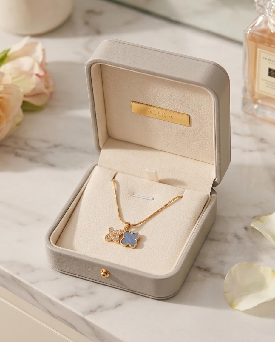 Gold‑Tone Double Clover Pendant Necklace with Crystal and Enamel Accents