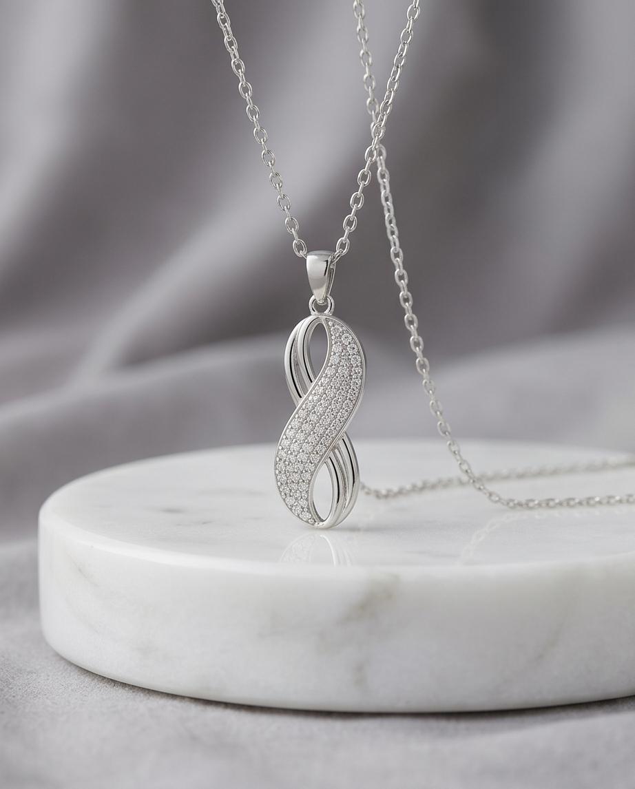 Silver‑Tone Infinity Pendant Necklace with Pavé Crystal Accents