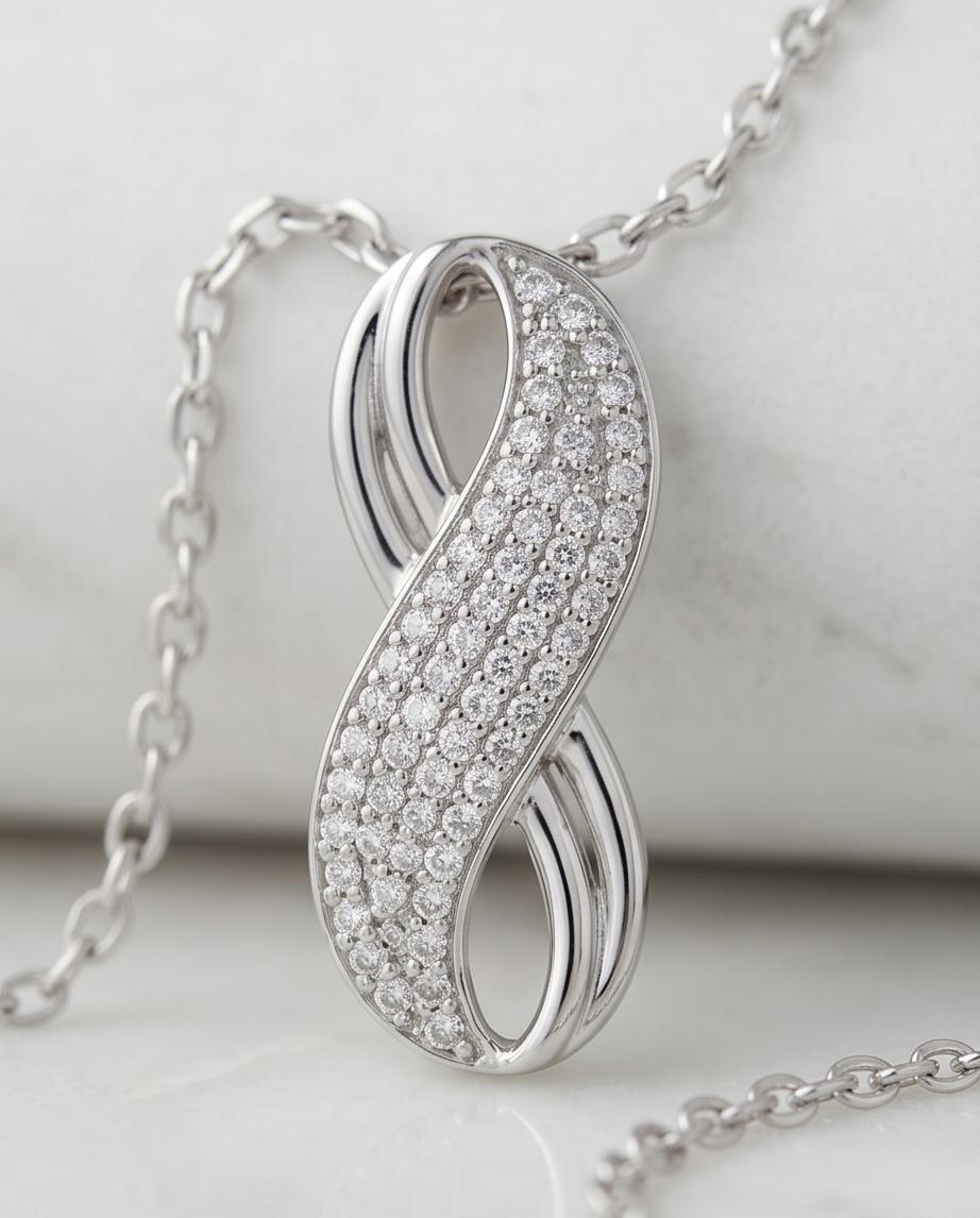 Silver‑Tone Infinity Pendant Necklace with Pavé Crystal Accents